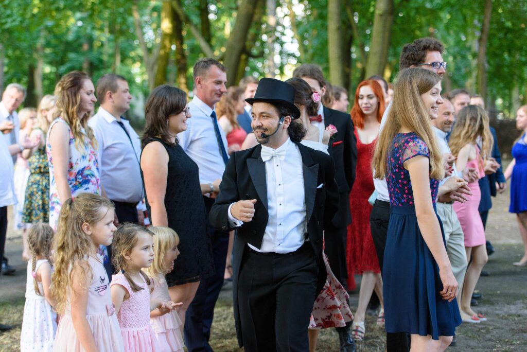 Karol Stolarski leading wedding guests