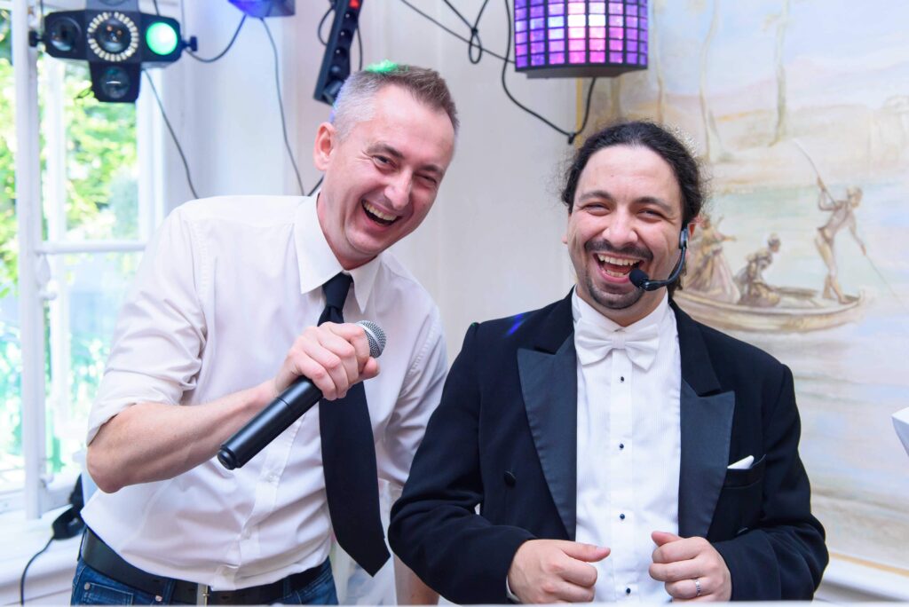 Karol Stolarski and his DJ at a wedding reception