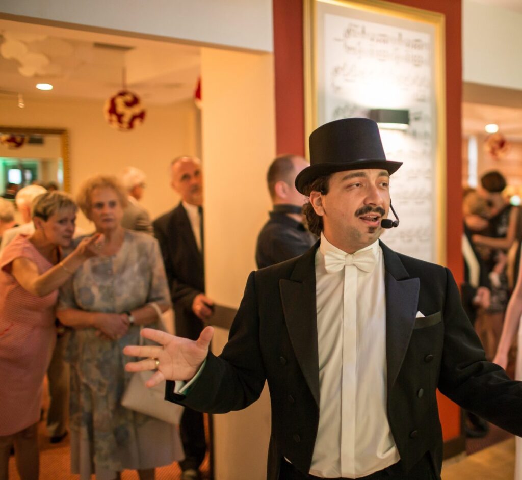 Karol welcoming guests at a Polish wedding reception